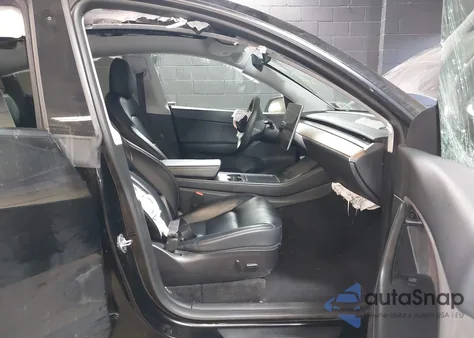 2022 Tesla Model Y Long Range Dual Motor All-Wheel Drive z USA, uszkodzony, nr VIN 7SAYGDEE4NF320766